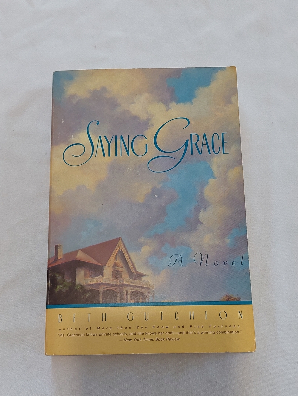 Saying Grace by Beth Gutcheon - Soft Pastel Sky Cover
